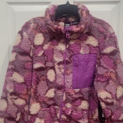 Billabong Women's Switchback Full Zip fleece jacket. This particular colorway is often described as "purple multi" or "dusty mauve abstract camo". Siz