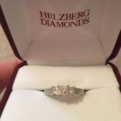 White gold engagement ring & woman's diamond wedding band