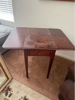 Table with Foldable Sides