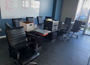 Conference Table with 6 chairs.