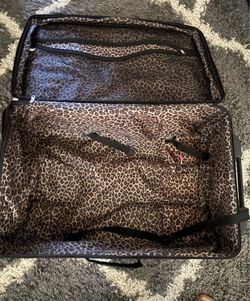 American Flyer cheetah suitcase
