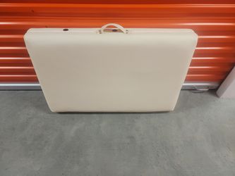 Massage table