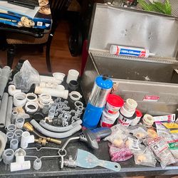 plumbers toolbox with tools parts