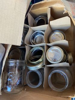 Lots of canning jars and canning supplies