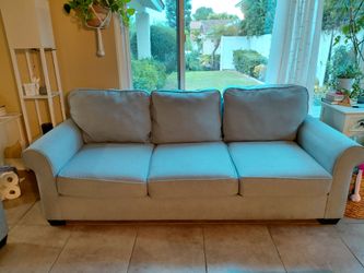 Matching sofa and love seat.
