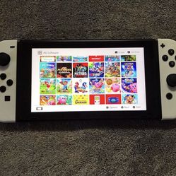 NINTENDO SWITCH V2 with 100 SWITCH GAMES INCLUDED