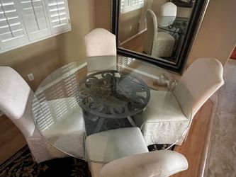 5’ round beveled glass dining table on wrought-iron and marble table base