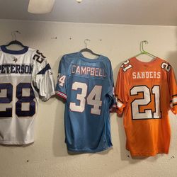 NFL JERSEYS A Peterson On Vikings, Earl Campbell N Barry Sanders College.