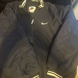 Vintage 1980s-1990s Nike Black and White Winter Pull Over Puffer Jacket