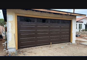 Brown Raised Panel Garage Door with Windows