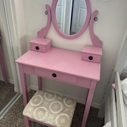 Vanity with cushioned stool