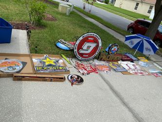 Metal signs, led glow up signs umbrellas and beer emblem flags.