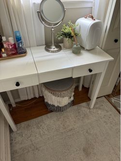 White desk/vanity with two drawers and flip top storage