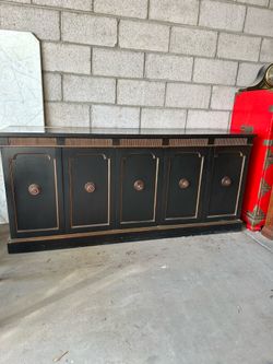 Black antique sideboard.