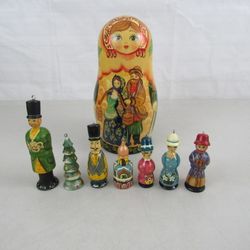 Vintage Russian Christmas Matryoshka Doll with 7 Ornaments Inside


