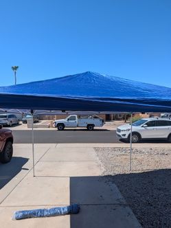 10x10 pop-up canopy blue top.