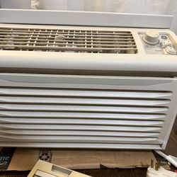 GE window AC with window frame