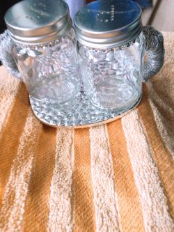 Beautiful hand knitted salt and pepper beaded with base