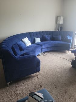 Blue Sectional Couch with pillows