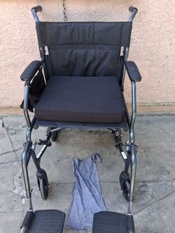 Folding Wheelchair with Cushion and Footrests
