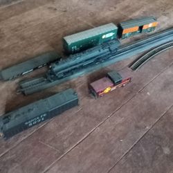 Train And Cars And A Few Pieces Of Track
