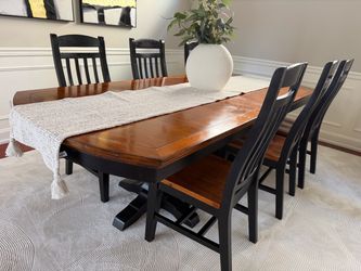 Double pedestal solid hardwood table + 6 matching chairs. Seats 12–14 fully extended