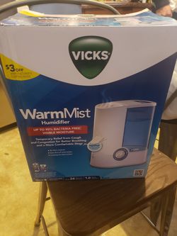 Vicks warm mist humidifier. Comes with some vapopads. No filters needed.