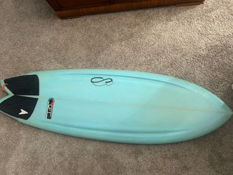 Stretch fish surf board