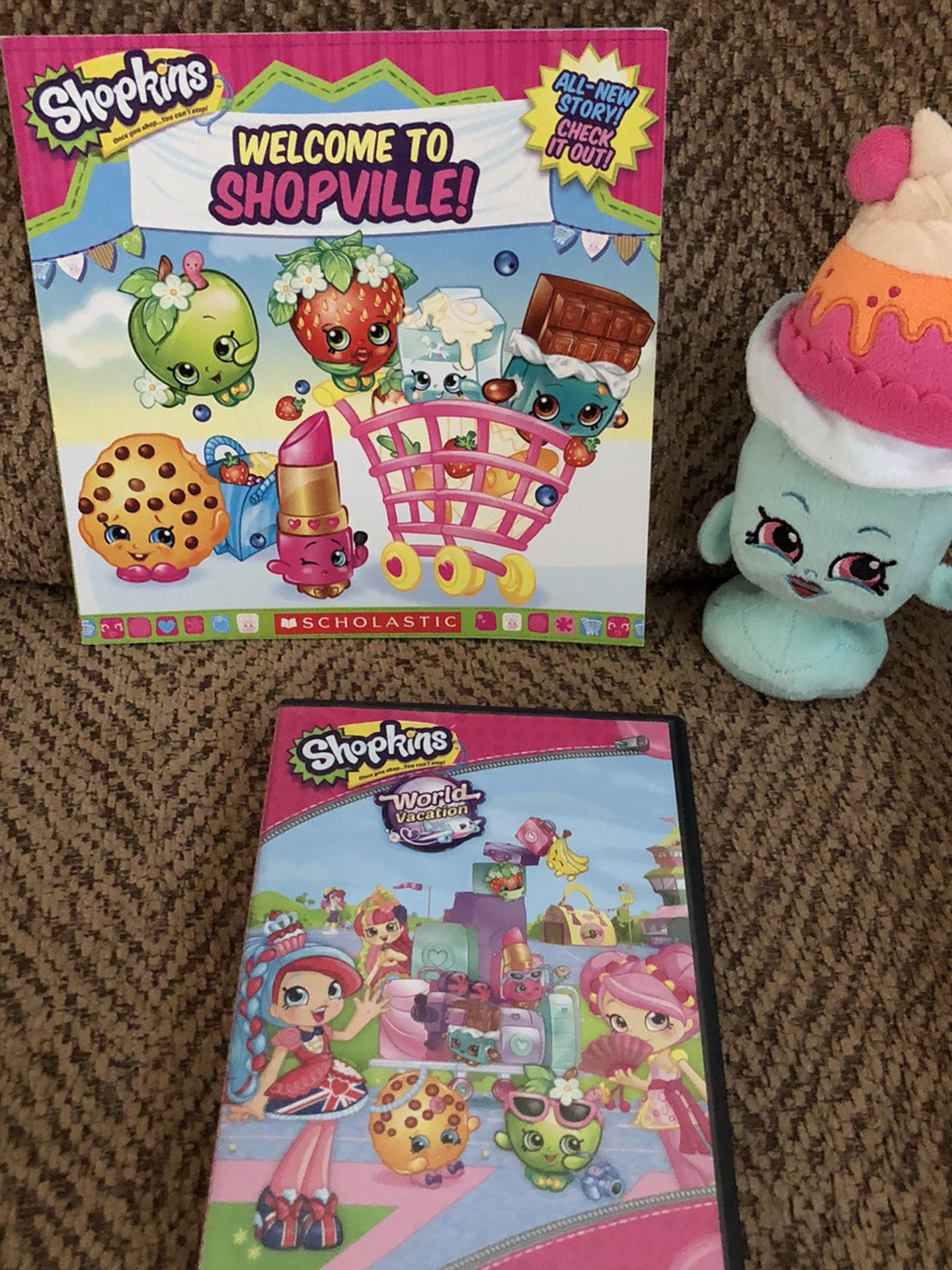 Shopkins book, plush toy, and dvd