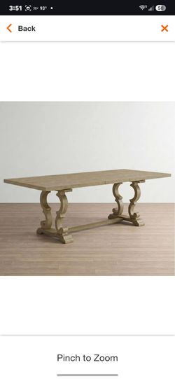 Ornate dining table with leaf