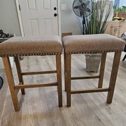 2 Upholstered Saddle Stools