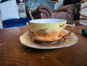 +2 This appears to be a vintage Lefton China teacup and saucer set