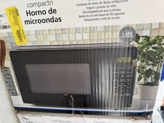 Mainstays 0.7 cu ft Countertop Microwave Oven new