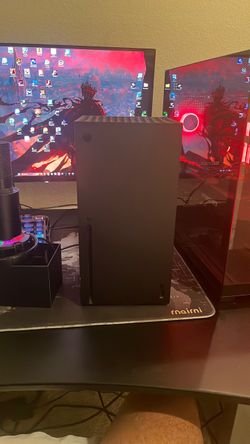 Microsoft Xbox Series X Console with controller