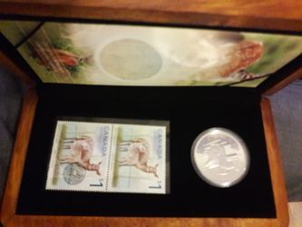 Canada deer and fawn stamp and coin collection