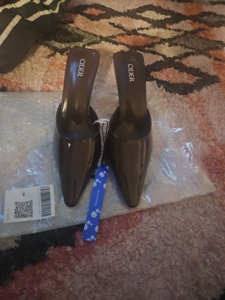 Brand New Never Worn Backless And Strapless Heel With Tags On