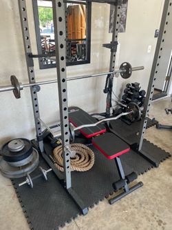 Home Gym Setup - Squat Rack, Dumbbells, Heavy Bag & Bike