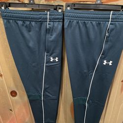 Under Armour Boys Joggers Pants size medium Retails 40.00 each asking 2 pairs for $40 