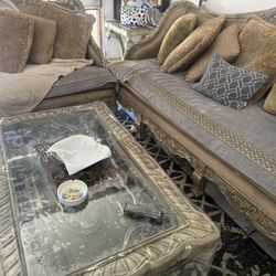 Dining table with six chairs and coffee table and small table and two couch one small one big