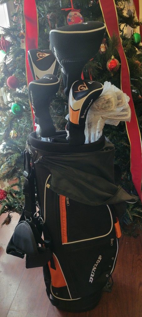 New 11 Piece Dunlop TiZ Tizenium left
Handed Golf Set With original dunlop bag