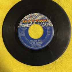 This item is a vintage Four Tops "Reach Out I'll Be There" 7-inch vinyl record released on the Motown label (Catalog number M-1098) in 1966.  Side A: 