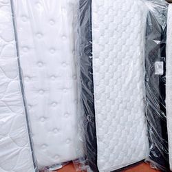Brand New Mattresses In The Factory Plastic