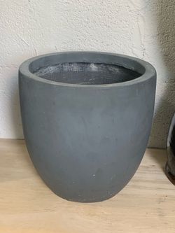 Grey fiberglass planter