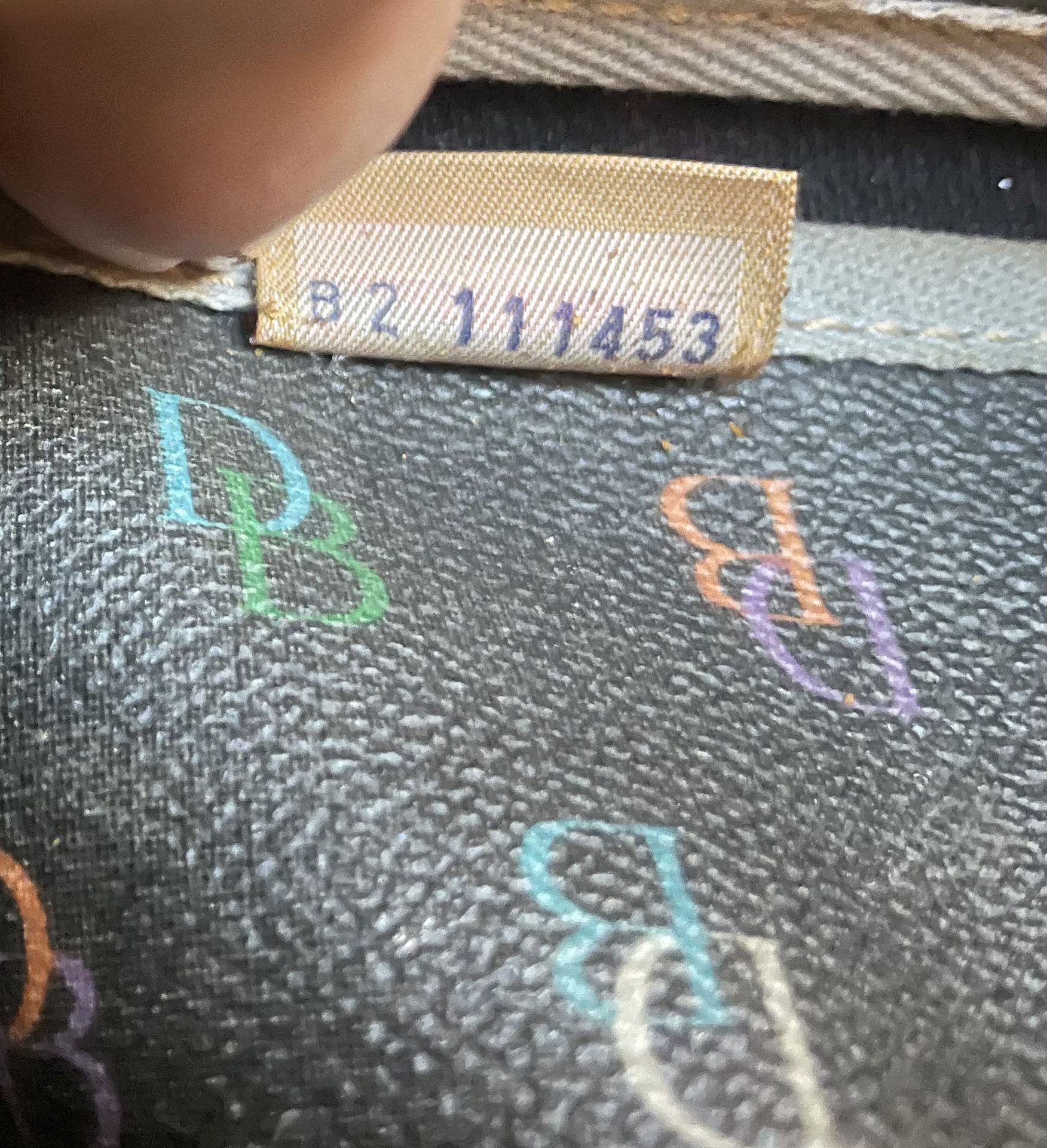 Cposted Dooney & Bourke Vintage Rainbow DB Black for Sale in Exeter, CA -  OfferUp