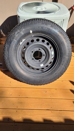 Brand new tire and rim