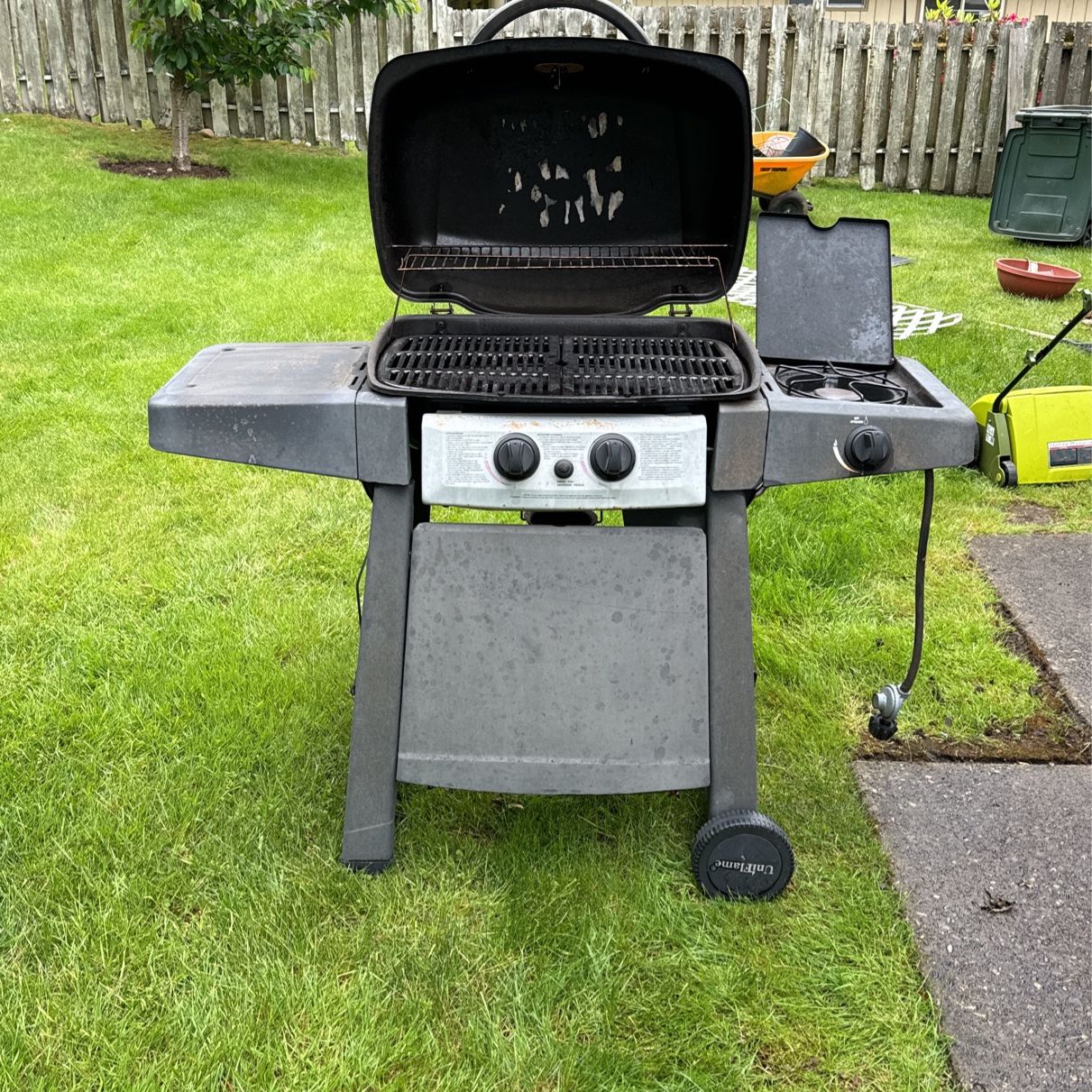 Outdoor Grill With Propane Tank (partially Filled)