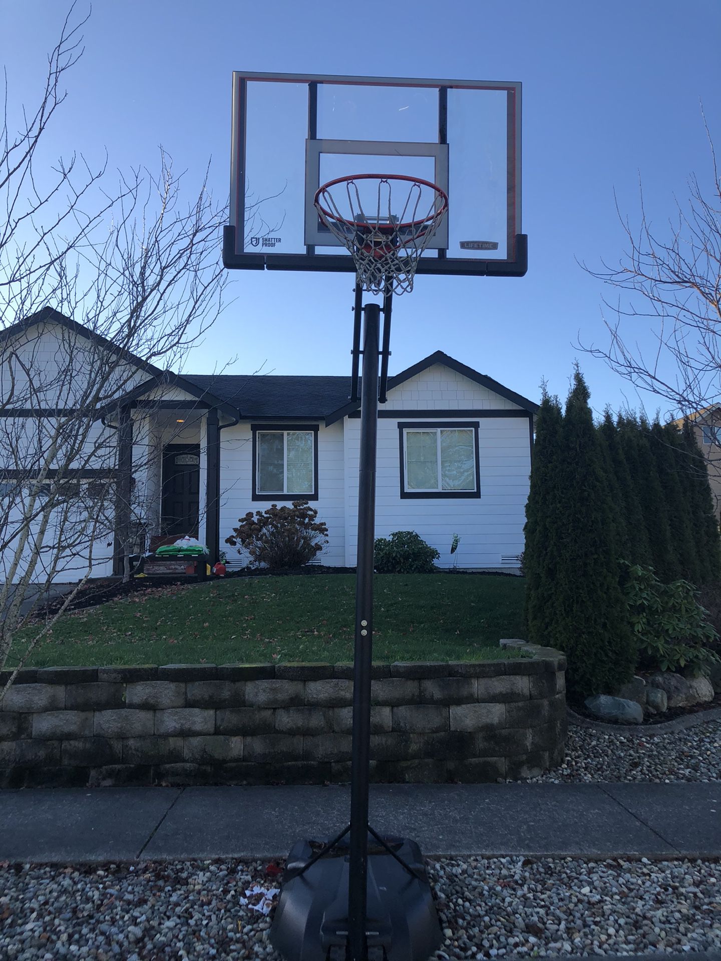 Adjustable adult basketball hoop