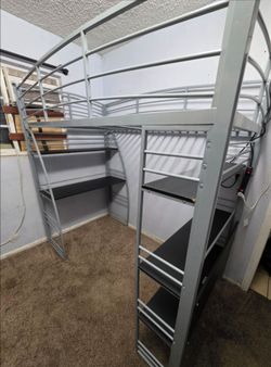 Twin bed frame with shelves and desk
