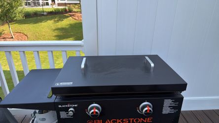 Only $169  for Two burner Blackstone grill with cover.