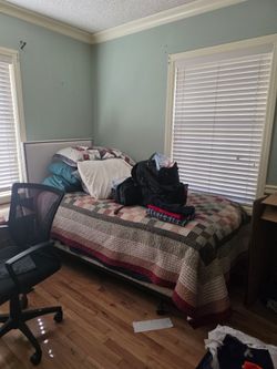 Twin bed, headboard, quilt sheets
